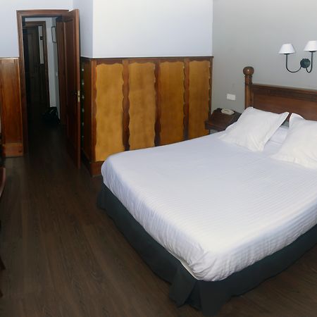 Hotel โกมิญาส ภายนอก รูปภาพ